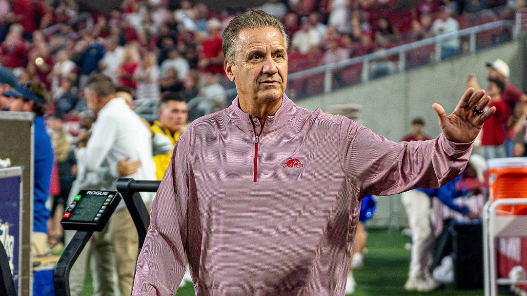Arkansas Razorbacks Men's Basketball coach John Calipari waves at fans during football game against Tulsa on Saturday, Sept. 26, 2026. Arkansas Razorbacks Men's Basketball coach John Calipari waves at fans during football game against Tulsa on Saturday, Sept. 26, 2026.