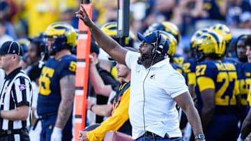 Michigan linebackers coach Brian Jean-Mary reacts to a play against USC during the second half at Michigan Stadium in Ann Arbor on Saturday, Sept. 21, 2024.