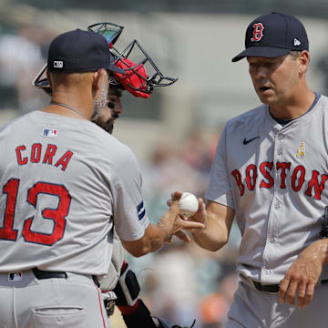 Boston Red Sox manager Alex Cora (13) take the ball to relieve Boston Red Sox pitcher Rich Hill (44) at Comerica Park on Sept. 1.