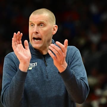 Mar 23, 2025; Milwaukee, WI, USA;  Kentucky Wildcats head coach Mark Pope reacts during the second half in the second round of the NCAA Tournament against the Illinois Fighting Illini at Fiserv Forum. Mandatory Credit: Benny Sieu-Imagn Images
