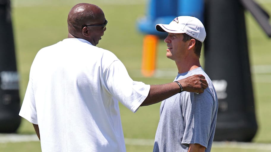 Former Ravens GM Ozzie Newsome and coach John Harbaugh
