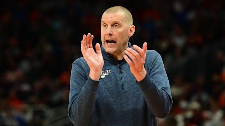 Mar 23, 2025; Milwaukee, WI, USA; Kentucky Wildcats head coach Mark Pope reacts during the second half in the second round of the NCAA Tournament against the Illinois Fighting Illini at Fiserv Forum. Mandatory Credit: Benny Sieu-Imagn Images Mar 23, 2025; Milwaukee, WI, USA; Kentucky Wildcats head coach Mark Pope reacts during the second half in the second round of the NCAA Tournament against the Illinois Fighting Illini at Fiserv Forum. Mandatory Credit: Benny Sieu-Imagn Images
