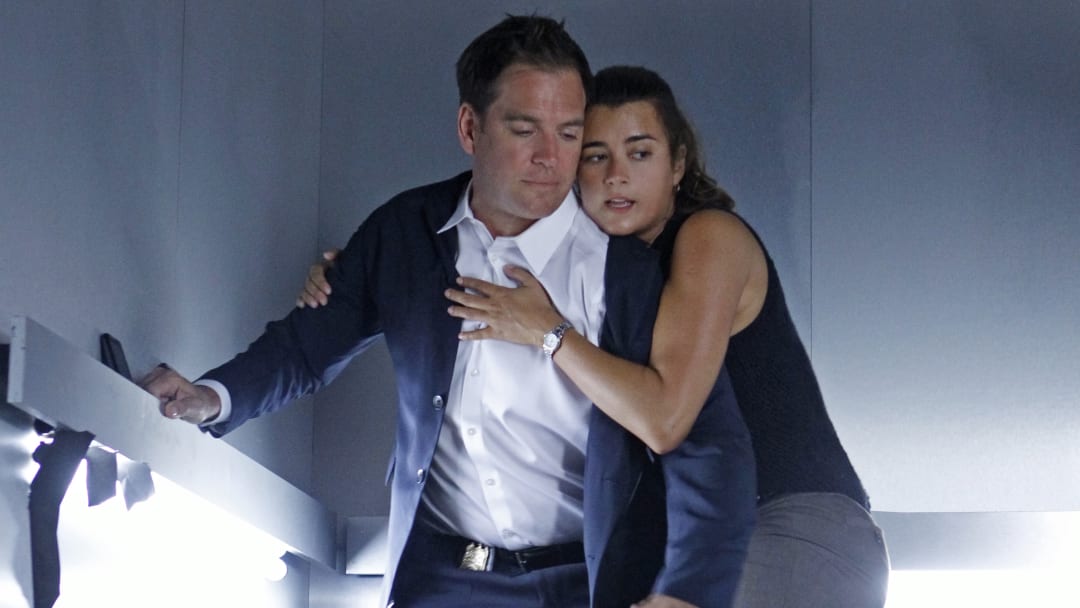 "Extreme Prejudice" -- Harper Dearing’s latest act of terrorism ripped through NCIS headquarters in last season’s cliffhanger finale, sparking a cross-agency manhunt for the criminal mastermind on the 10th season premiere of NCIS, Tuesday, Sept. 25 (8:00-9:00 PM, ET/PT) on the CBS Television Network. Pictured left to right: Michael Weatherly and Cote de Pablo Photo: Monty Brinton/CBS 
©2012 CBS Broadcasting Inc. All Rights Reserved.