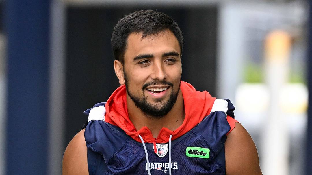 Jun 9, 2025; Foxborough, MA, USA; New England Patriots linebacker Christian Elliss (53) walks to the practice fields at Gillette Stadium. Mandatory Credit: Eric Canha-Imagn Images Jun 9, 2025; Foxborough, MA, USA; New England Patriots linebacker Christian Elliss (53) walks to the practice fields at Gillette Stadium. Mandatory Credit: Eric Canha-Imagn Images