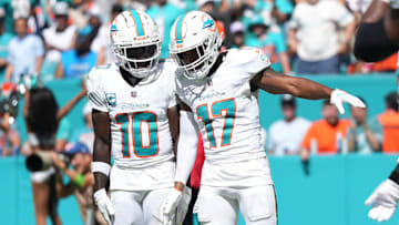 Miami Dolphins wide receiver Jaylen Waddle (17) celebrates his touchdown with wide receiver Tyreek