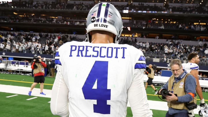 Dallas Cowboys quarterback Dak Prescott walks off the field after losing in the 2024 NFC wild card game against the Green Bay Packers at AT&T Stadium. 