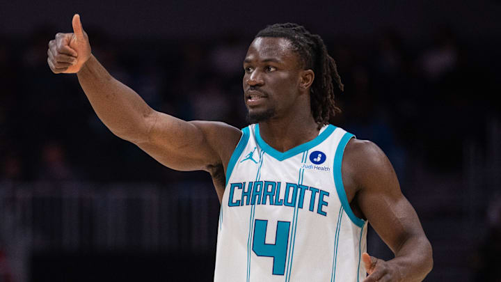 Feb 28, 2026; Charlotte, North Carolina, USA; Charlotte Hornets guard Sion James (4) reacts during the first quarter against the Portland Trail Blazers at Spectrum Center. Mandatory Credit: Scott Kinser-Imagn Images