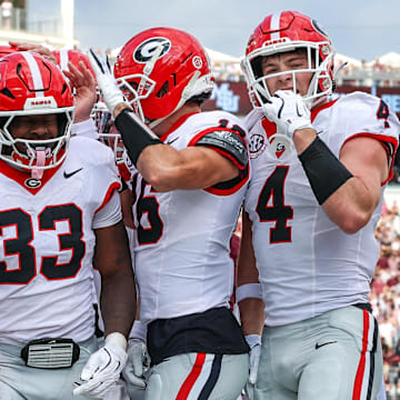 Georgia Bulldogs running back Chauncey Bowens (33) reacts after a touchdown against the Mississippi State Bulldogs during the first half at Davis Wade Stadium at Scott Field.