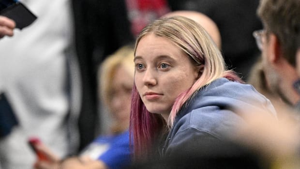 Paige Bueckers watches the game between the Dallas Mavericks and the New York Knicks