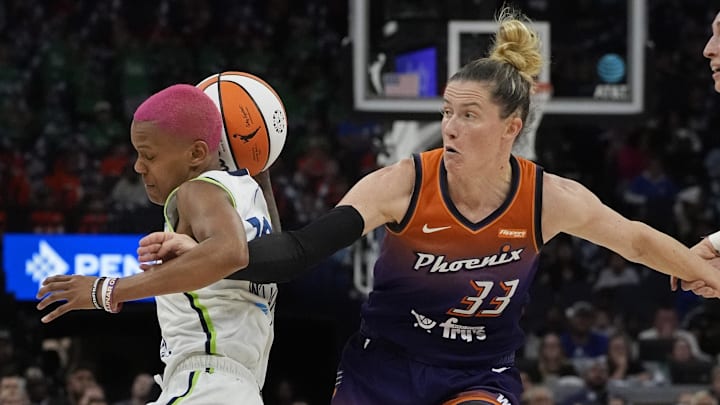 Jul 16, 2025; Minneapolis, Minnesota, USA; Minnesota Lynx guard Courtney Williams (10) has trouble with the ball as Phoenix Mercury guard Sami Whitcomb (33) tries for it in the first quarter at Target Center. Mandatory Credit: Bruce Kluckhohn-Imagn Images Jul 16, 2025; Minneapolis, Minnesota, USA; Minnesota Lynx guard Courtney Williams (10) has trouble with the ball as Phoenix Mercury guard Sami Whitcomb (33) tries for it in the first quarter at Target Center. Mandatory Credit: Bruce Kluckhohn-Imagn Images
