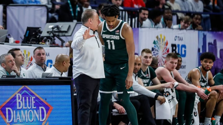 Michigan State head coach Tom Izzo talks to guard A.J. Hoggard (11) during the first half of quarterfinal of Big Ten tournament at Target Center in Minneapolis, Minn. on Friday, March 15, 2024.