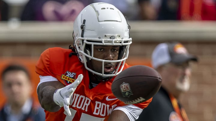Jan 28, 2025; Mobile, AL, USA; American team wide receiver Jalen Royals of Utah State (17) tracks down a pass during Senior Bowl practice for the American team at Hancock Whitney Stadium. Mandatory Credit: Vasha Hunt-Imagn Images Jan 28, 2025; Mobile, AL, USA; American team wide receiver Jalen Royals of Utah State (17) tracks down a pass during Senior Bowl practice for the American team at Hancock Whitney Stadium. Mandatory Credit: Vasha Hunt-Imagn Images