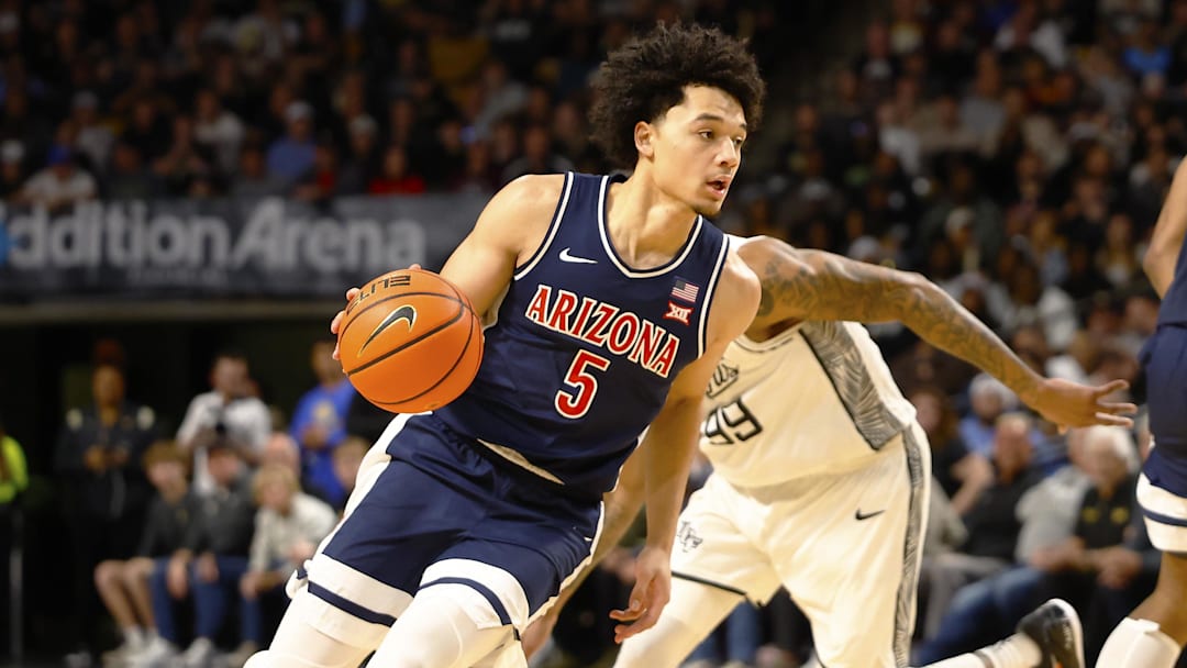 Jan 17, 2026; Orlando, Florida, USA; Arizona Wildcats guard Brayden Burries (5) drives to the basket in the second half against the Central Florida Knights at Addition Financial Arena. Mandatory Credit: Russell Lansford-Imagn Images Jan 17, 2026; Orlando, Florida, USA; Arizona Wildcats guard Brayden Burries (5) drives to the basket in the second half against the Central Florida Knights at Addition Financial Arena. Mandatory Credit: Russell Lansford-Imagn Images