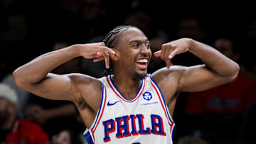 Nov 2, 2025; Brooklyn, New York, USA; Philadelphia 76ers guard Tyrese Maxey (0) flexes his muscles from the bench during the second half against the Brooklyn Nets at Barclays Center. Mandatory Credit: John Jones-Imagn Images