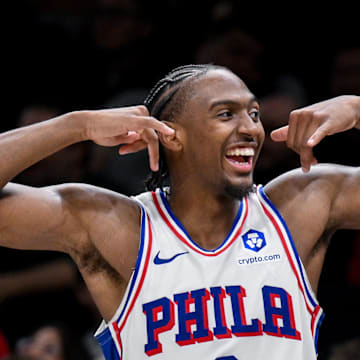 Nov 2, 2025; Brooklyn, New York, USA; Philadelphia 76ers guard Tyrese Maxey (0) flexes his muscles from the bench during the second half against the Brooklyn Nets at Barclays Center. Mandatory Credit: John Jones-Imagn Images