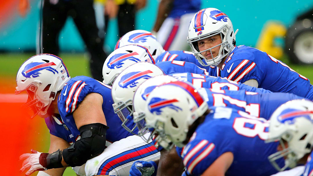 Buffalo Bills quarterback Josh Allen (17) looks over the offensive line against the Miami Dolphins.