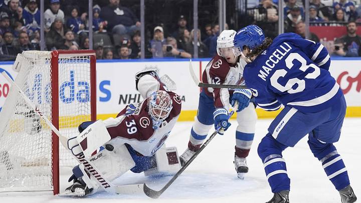 Jan 25, 2026; Toronto, Ontario, CAN; Colorado Avalanche goaltender MacKenzie Blackwood (39) makes a save on Toronto Maple Leafs forward Matias Maccelli (63) during the third period at Scotiabank Arena. Mandatory Credit: John E. Sokolowski-Imagn Images