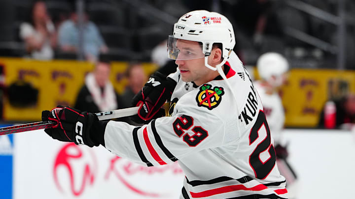Apr 16, 2024; Las Vegas, Nevada, USA; Chicago Blackhawks center Philipp Kurashev (23) warms up before a game against the Vegas Golden Knights at T-Mobile Arena. Mandatory Credit: Stephen R. Sylvanie-Imagn Images