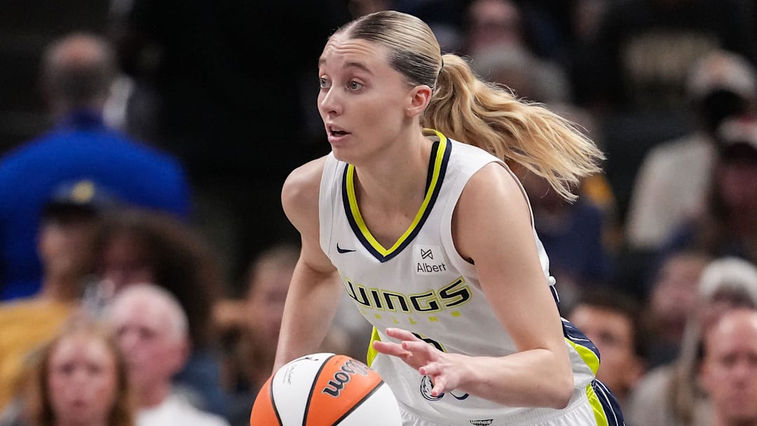 Dallas Wings guard Paige Bueckers (5) rushes up the court Tuesday, Aug. 12, 2025, during the game at Gainbridge Fieldhouse in Indianapolis. The Dallas Wings defeated the Indiana Fever, 81-80.