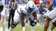 Sep 28, 2024; Oxford, Mississippi, USA; Kentucky Wildcats offensive lineman Jalen Farmer (52) waits for the snap during the first half against the Mississippi Rebels at Vaught-Hemingway Stadium. Mandatory Credit: Petre Thomas-Imagn Images