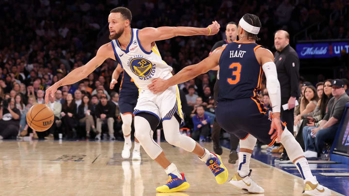 Feb 29, 2024; New York, New York, USA; New York Knicks guard Josh Hart (3) grabs Golden State Warriors guard Stephen Curry (30) during the third quarter at Madison Square Garden. Mandatory Credit: Brad Penner-USA TODAY Sports
