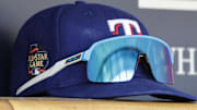 Texas Rangers cap sits in dugout in the first inning against the Detroit Tigers at Comerica Park. 