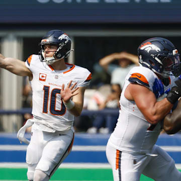 Sep 8, 2024; Seattle, Washington, USA; Denver Broncos quarterback Bo Nix (10) passes against the Seattle Seahawks during the second quarter at Lumen Field. 