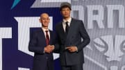 Jun 26, 2024; Brooklyn, NY, USA; Tidjane Salaun poses for photos with NBA commissioner Adam Silver after being selected in the first round by the Charlotte Hornets in the 2024 NBA Draft at Barclays Center. Mandatory Credit: Brad Penner-USA TODAY Sports