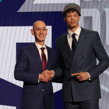 Jun 26, 2024; Brooklyn, NY, USA; Tidjane Salaun poses for photos with NBA commissioner Adam Silver after being selected in the first round by the Charlotte Hornets in the 2024 NBA Draft at Barclays Center. Mandatory Credit: Brad Penner-USA TODAY Sports