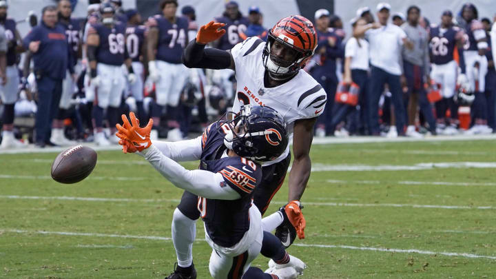 Aug 17, 2024; Chicago, Illinois, USA; Cincinnati Bengals safety Josh Newton (28) defends Chicago Bears wide receiver Tyler Scott (10) during the first half at Soldier Field. Mandatory Credit: David Banks-USA TODAY Sports