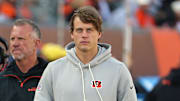 Oct 26, 2025; Cincinnati, Ohio, USA; Cincinnati Bengals quarterback Joe Burrow (9) looks on on the sidelines during the second quarter against the New York Jets at Paycor Stadium. Mandatory Credit: Joseph Maiorana-Imagn Images