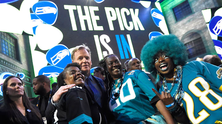 NFL Commisioner Roger Goodell poses with Jaguars fans during the first round of the NFL Draft Thursday, April 25, 2019, in Nashville, Tenn.