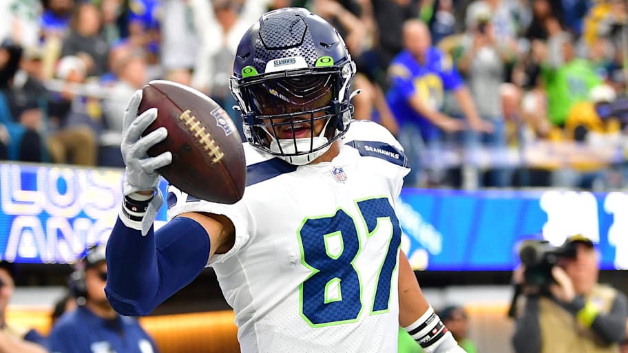 Dec 4, 2022; Inglewood, California, USA; Seattle Seahawks tight end Noah Fant (87) celebrates his touchdown scored against the Los Angeles Rams during the first half at SoFi Stadium. Mandatory Credit: Gary A. Vasquez-Imagn Images | Gary A. Vasquez-Imagn Images