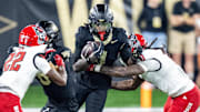 Sep 11, 2025; Winston-Salem, North Carolina, USA;  Wake Forest Demon Deacons wide receiver Sterling Berkhalter (4) catches a pass in the first half against North Carolina State Wolfpack at Allegacy Federal Credit Union Stadium. Mandatory Credit: Luke Jamroz-Imagn Images
