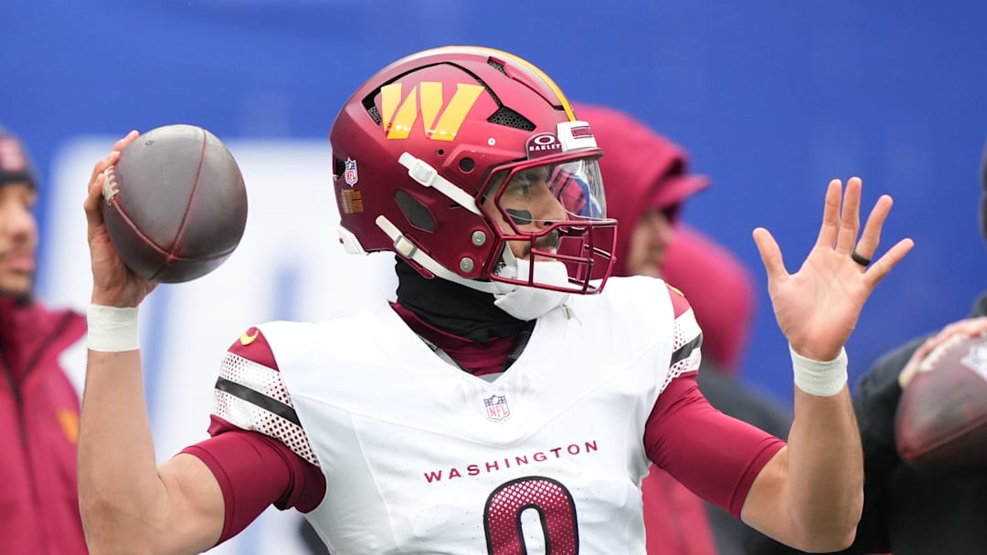 Washington Commanders quarterback Marcus Mariota warms up prior to the game against the New York Giants.