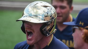 Notre Dame's Jack Brannigan (9) celebrates after hitting a homer that put the Fighting Irish in the
