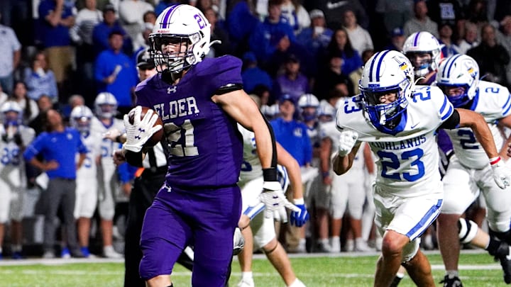 Elder Panthers running back runs the ball to the end zone for a touchdown in the first half of a high school football game between the Elder Panthers and Highlands Bluebirds, Friday, Oct. 10, 2025, at The Pit in Cincinnati. Elder Panthers running back runs the ball to the end zone for a touchdown in the first half of a high school football game between the Elder Panthers and Highlands Bluebirds, Friday, Oct. 10, 2025, at The Pit in Cincinnati.