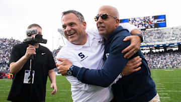 Penn State athletic director Pat Kraft gives head football coach James Franklin a big hug following a 33-24 win over Indiana at Beaver Stadium Saturday, Oct. 28, 2023, in State College, Pa.