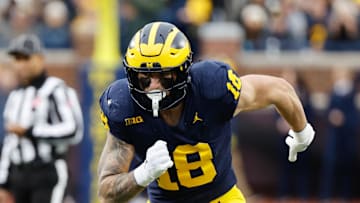 Nov 23, 2024; Ann Arbor, Michigan, USA;  Michigan Wolverines tight end Colston Loveland (18) runs a route against the Northwestern Wildcats at Michigan Stadium. Mandatory Credit: Rick Osentoski-Imagn Images