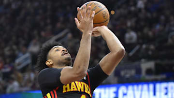 Nov 27, 2024; Cleveland, Ohio, USA; Atlanta Hawks guard Kobe Bufkin (4) shoots in the first quarter against the Cleveland Cavaliers at Rocket Mortgage FieldHouse. Mandatory Credit: David Richard-Imagn Images