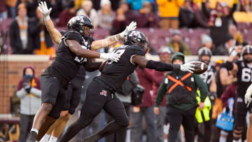 Oct 28, 2023; Minneapolis, Minnesota, USA;  Minnesota Golden Gophers defensive lineman Jah Joyner (17) celebrates his strip-sack and fumble recovery against the Michigan State Spartans with defensive lineman Jalen Logan-Redding (97) during the fourth quarter at Huntington Bank Stadium.