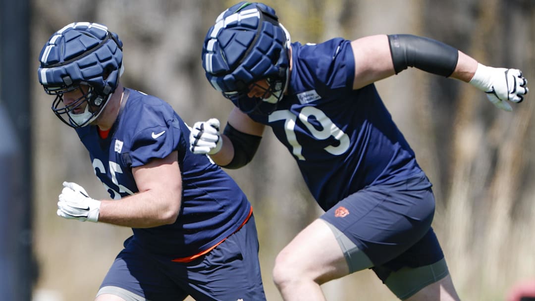 May 9, 2025; Lake Forest, IL, USA; Chicago Bears offensive line Luke Newman (65) and Theo Benedet (79) run during the Rookie Minicamp at Halas Hall. Mandatory Credit: Kamil Krzaczynski-Imagn Images