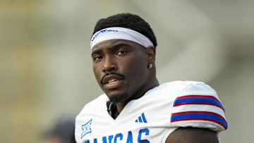 Sep 6, 2025; Columbia, Missouri, USA; Kansas Jayhawks quarterback Jalon Daniels (6) reacts during the second half against the Missouri Tigers at Faurot Field at Memorial Stadium. Mandatory Credit: Jay Biggerstaff-Imagn Images