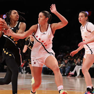 Apr 1, 2025; Brooklyn, NY, USA; McDonald's All American East wing Nyla Brooks (7) drives to the basket against McDonald's All American West guard Addie Deal (7) during the second half of the game at Barclays Center. Mandatory Credit: Pamela Smith-Imagn Images
