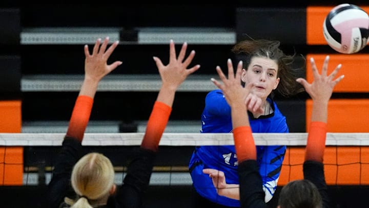 Clear Creek Amana’s Averie Lower (17) attacks the West Delaware defense during the Wamac Conference Volleyball Tournament semifinals Oct. 16, 2025 in Solon, Iowa. Clear Creek Amana’s Averie Lower (17) attacks the West Delaware defense during the Wamac Conference Volleyball Tournament semifinals Oct. 16, 2025 in Solon, Iowa.