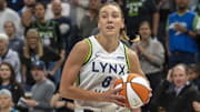 May 23, 2025; Minneapolis, Minnesota, USA; Minnesota Lynx forward Alanna Smith (8) drives to the basket against the Connecticut Sun in the first half at Target Center. Mandatory Credit: Jesse Johnson-Imagn Images