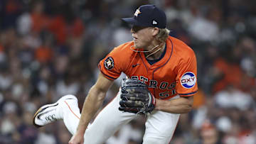 Aug 15, 2025; Houston, Texas, USA; Houston Astros relief pitcher Jordan Weems (51) delivers a pitch during the ninth inning against the Baltimore Orioles at Daikin Park.