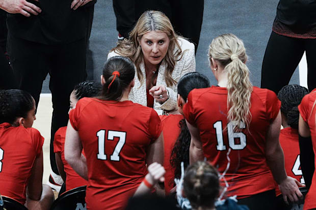Louisville head coach Dani Busboom Kelly instructs her players during the 2024 NCAA championship match against Penn State.