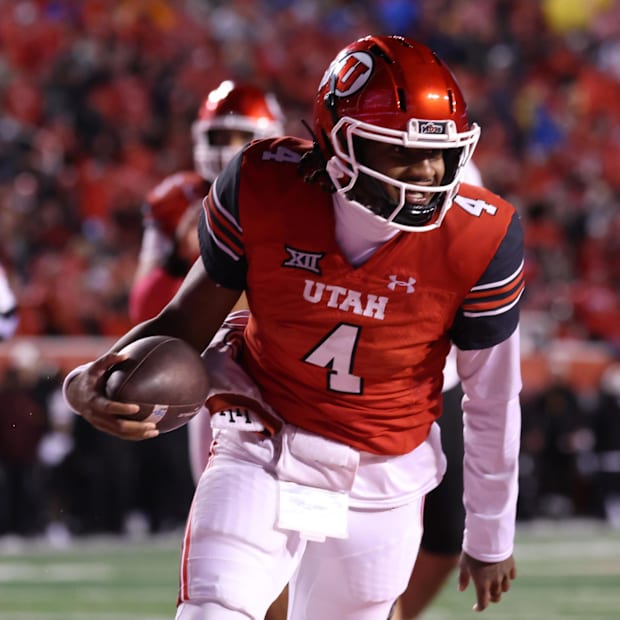 Oct 11, 2025; Salt Lake City, Utah, USA; Utah Utes quarterback Devon Dampier (4) scores a touchdown against the Arizona State