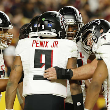 The Atlanta Falcons celebrate a touchdown against the Washington Commanders during Week 17 of the 2024 NFL season.